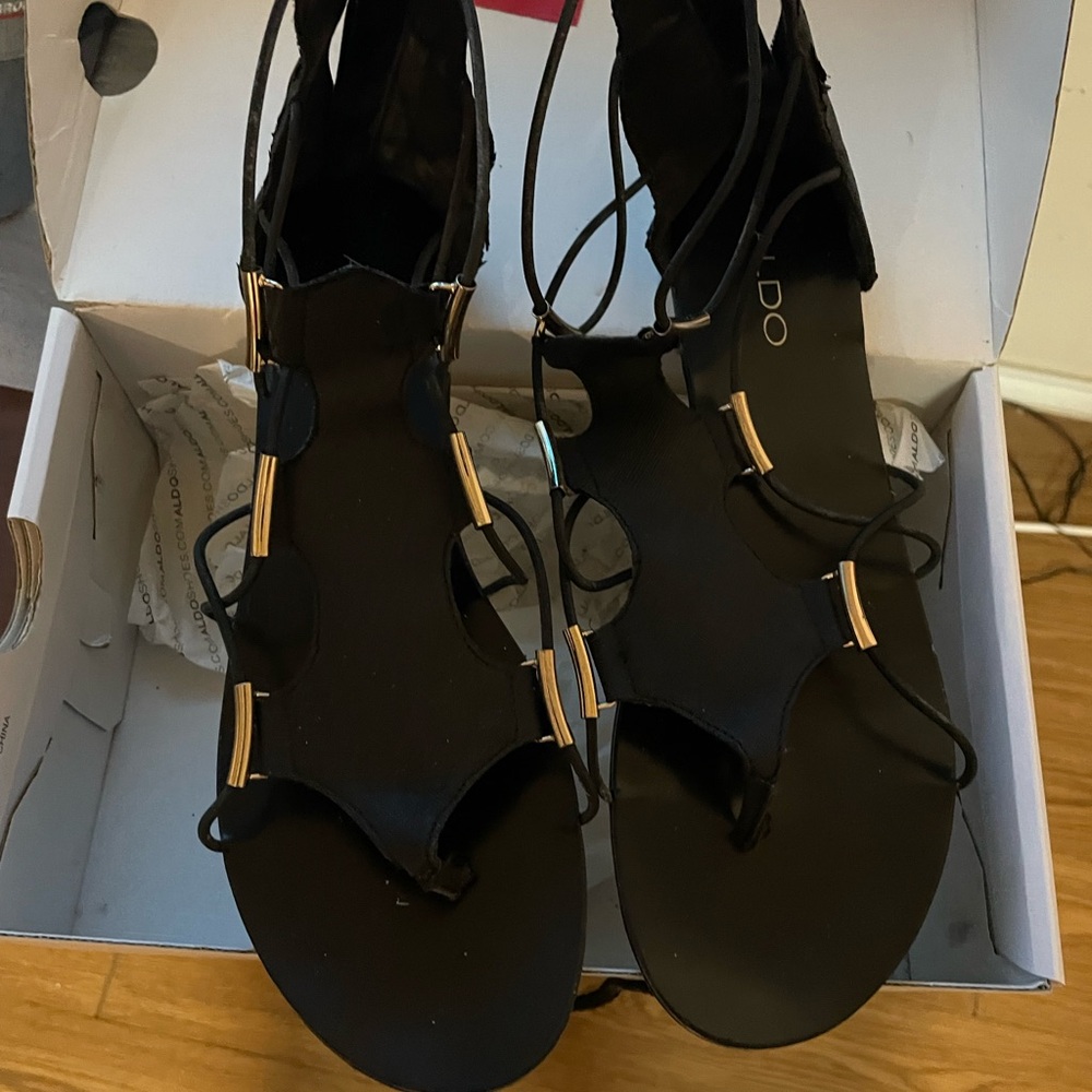 Aldo Black and Gold Strappy Sandals
